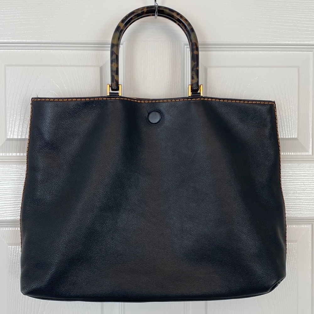 Reversible leather purse with tortoise handle